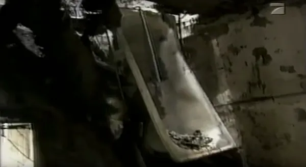 Within a 6-second pan of the basement, a bathtub could be seen distressingly perched on the interior basement stairs. The redrawing of the bathtub deduces that a second-floor bathroom was located by the central staircase. When the fire spread through the stair’s vertical airway, it deteriorated the surrounding structure and collapsed the floor under the bathroom. The bathtub, a vessel to hold water and cleanse the body, would be instead an object that trapped those escaping through the basement’s exit in fire.